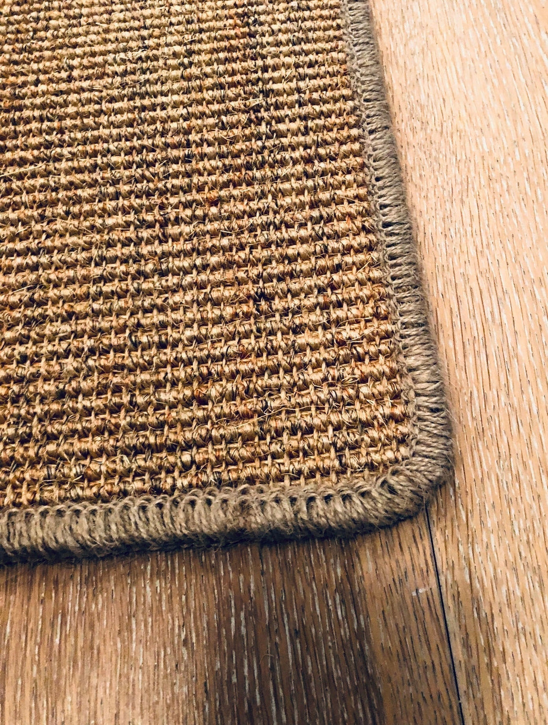 Durable rug overlocking edges showing long-lasting stitching in a Sydney home