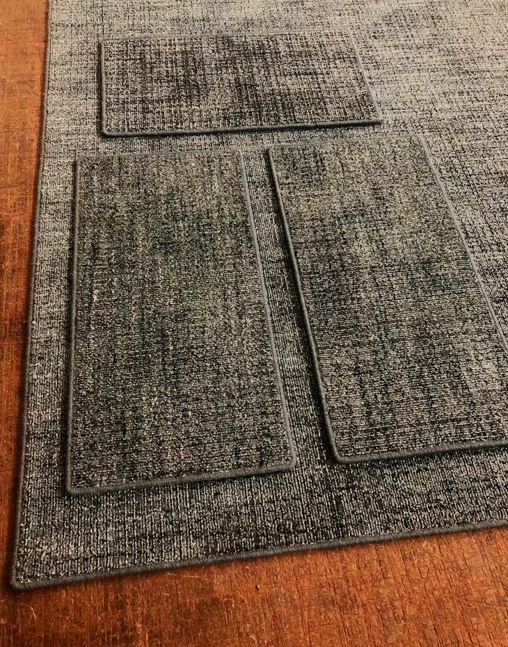 Rug overlocking edge stitching on a carpet rug in Sydney showing durable finished edges