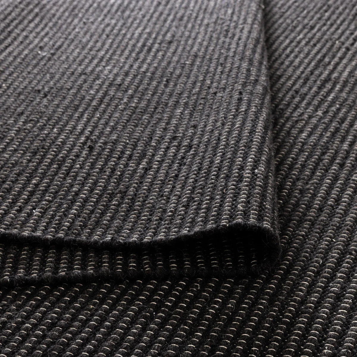 Nova Handwoven Black Wool Rug