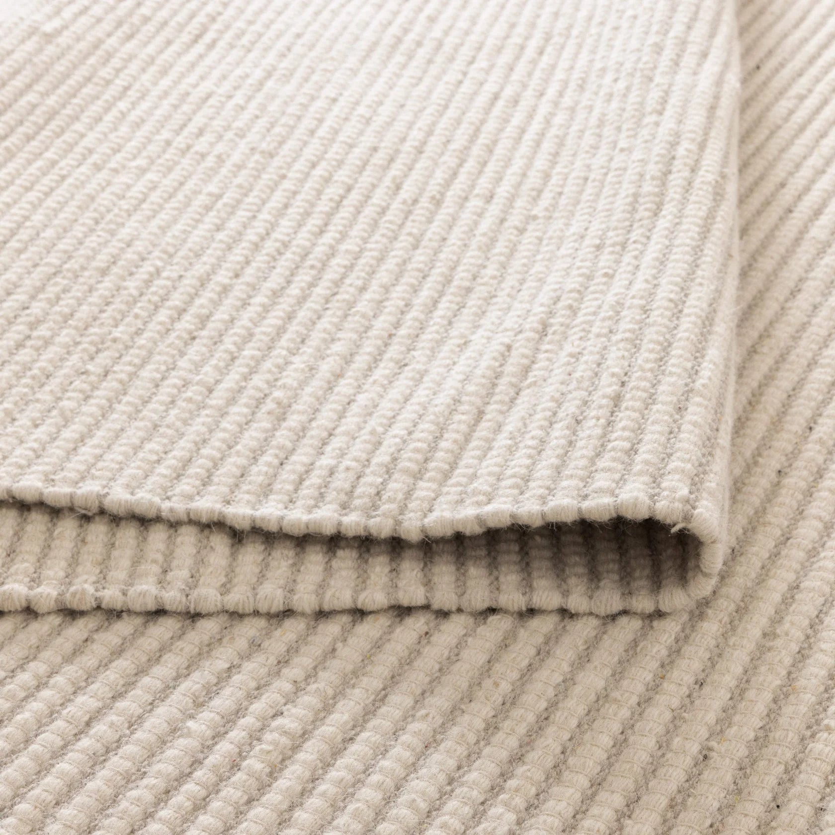 handwoven-double sided textured wool rug 